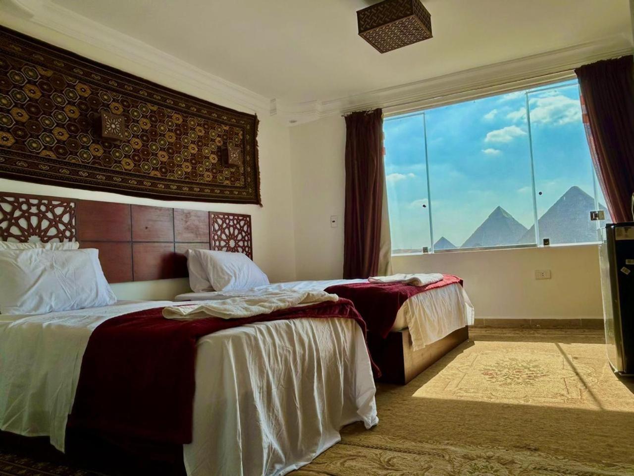 Готель Oscar Pyramids View Nazlet el-Sisi Номер фото
