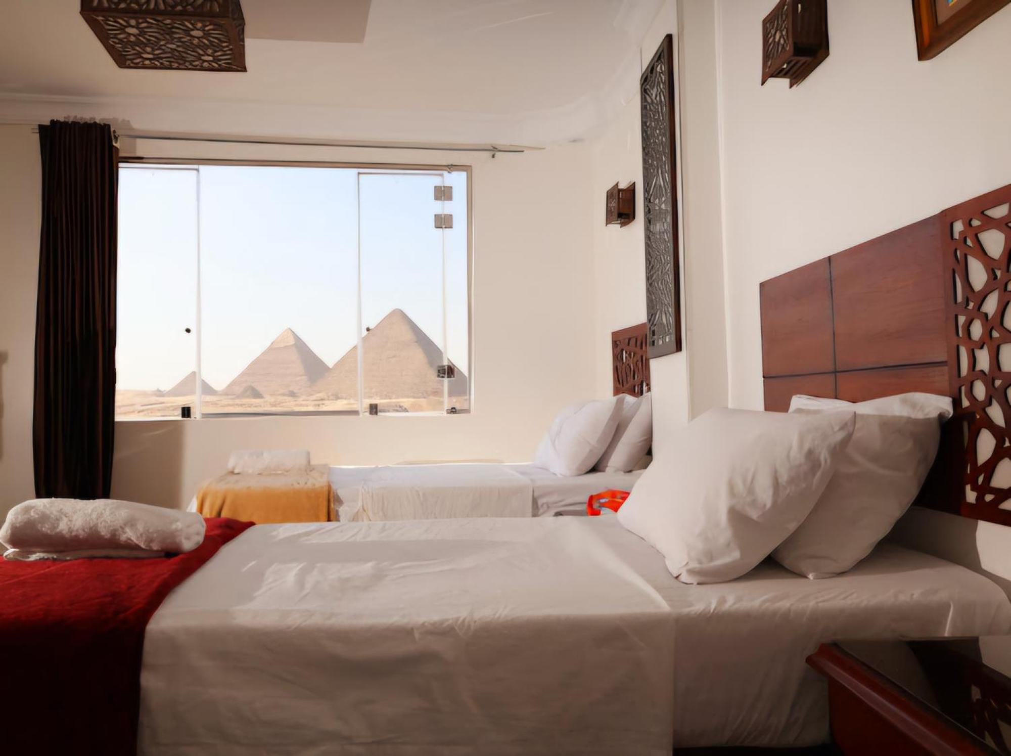 Готель Oscar Pyramids View Nazlet el-Sisi Номер фото