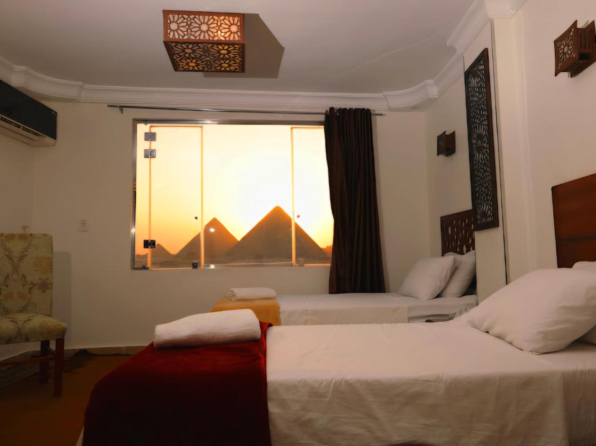 Готель Oscar Pyramids View Nazlet el-Sisi Номер фото